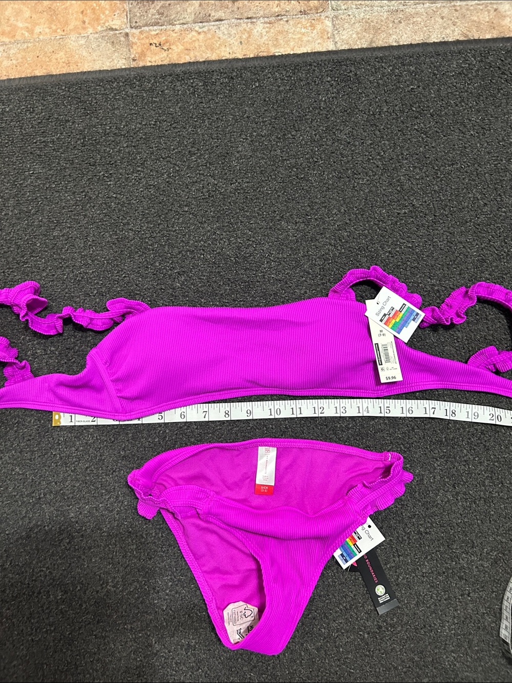 Juniors Bright Magenta Ruffle Two-Piece Swim Set. Top is med and bottoms small .